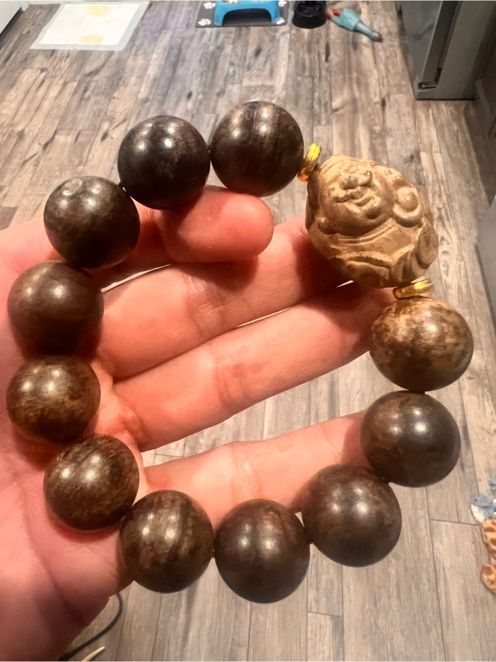 Natural Brown Wood Bead Bracelet with Carved Accent